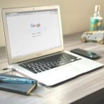 Unlocking the potential of your online presence: SEO in action, with a laptop showing the Google search page ready to connect you with your target audience.